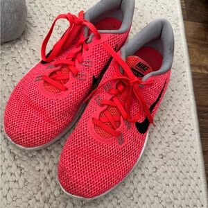 Bright pink Nike shoes